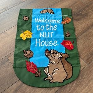 Welcome to the Nut House Garden flag